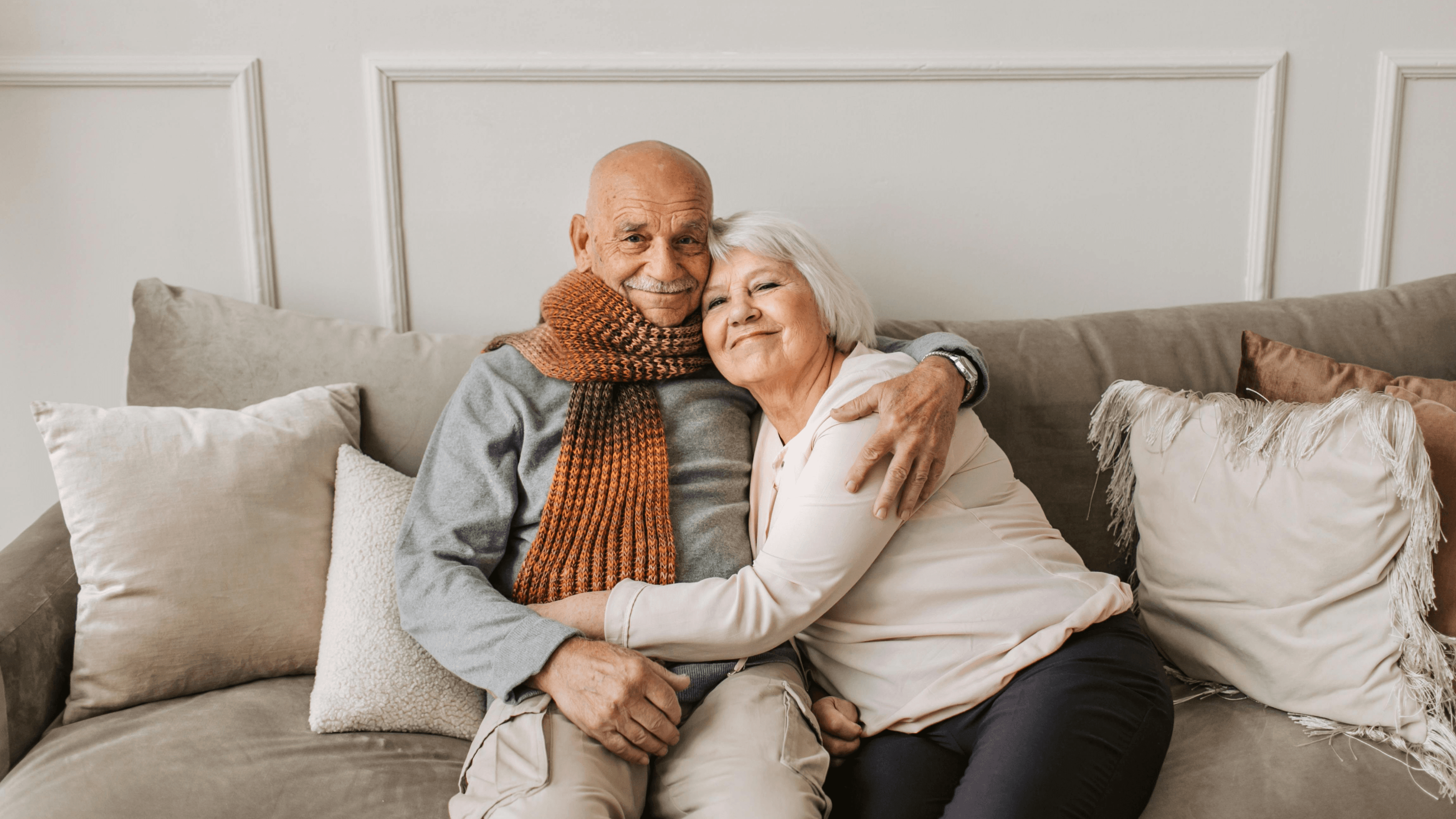 Image of an elderly couple hugging each other